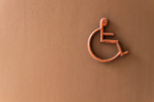 SSDI-Law-Firm-Milwaukee, WI-Hickey-&-Turim-SC - disabled person sign on wall